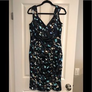 Maggy London satin Cocktail dress.  Beautiful dress with flattering details.